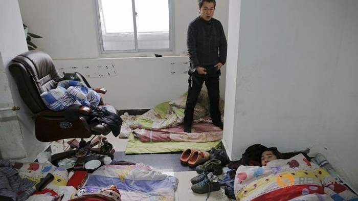 Unpaid and angry, some Chinese workers ditch holidays to protest